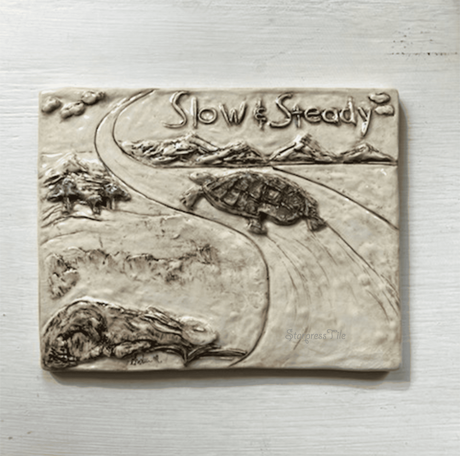 Tortoise and the Hare Ceramic Wall Art. Sleeping hare and walking tortoise.